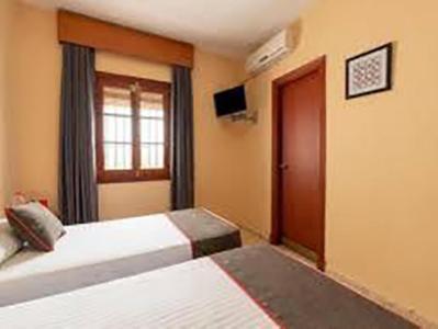 Hostal-Restaurante El Paisano Guadalema de los Quinteros Exteriör bild